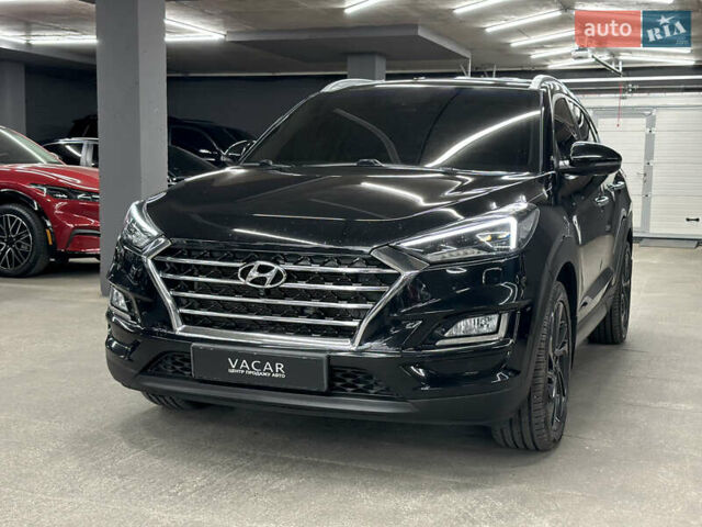 Черный Хендай Туксон, объемом двигателя 2 л и пробегом 153 тыс. км за 20500 $, фото 8 на Automoto.ua