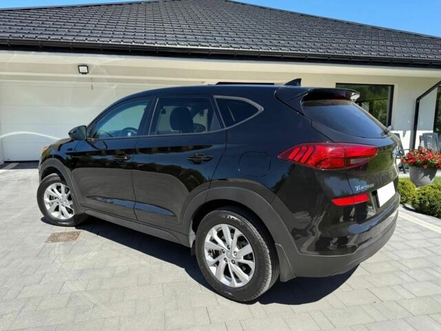 Черный Хендай Туксон, объемом двигателя 2 л и пробегом 80 тыс. км за 9500 $, фото 4 на Automoto.ua