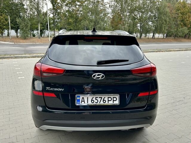 Черный Хендай Туксон, объемом двигателя 2.4 л и пробегом 147 тыс. км за 16400 $, фото 4 на Automoto.ua