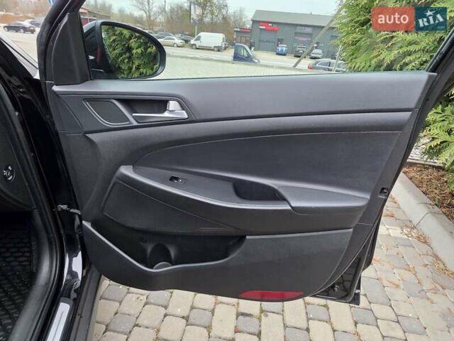Черный Хендай Туксон, объемом двигателя 2 л и пробегом 151 тыс. км за 18950 $, фото 48 на Automoto.ua