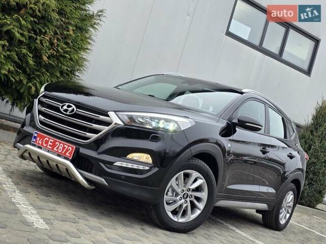 Черный Хендай Туксон, объемом двигателя 2 л и пробегом 151 тыс. км за 18950 $, фото 10 на Automoto.ua