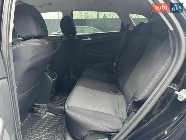 Чорний Хендай Туксон, об'ємом двигуна 2 л та пробігом 84 тис. км за 19000 $, фото 30 на Automoto.ua