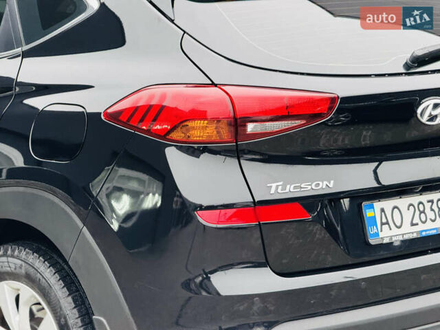 Чорний Хендай Туксон, об'ємом двигуна 2 л та пробігом 84 тис. км за 19000 $, фото 18 на Automoto.ua