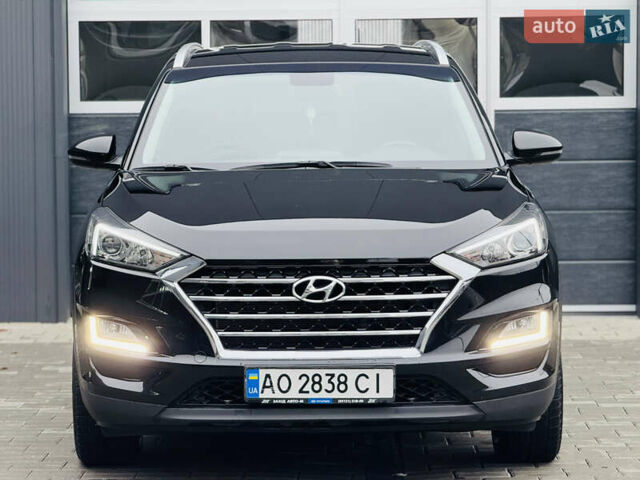 Чорний Хендай Туксон, об'ємом двигуна 2 л та пробігом 84 тис. км за 19000 $, фото 12 на Automoto.ua