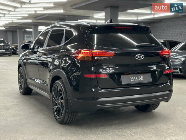 Черный Хендай Туксон, объемом двигателя 2 л и пробегом 153 тыс. км за 20500 $, фото 3 на Automoto.ua