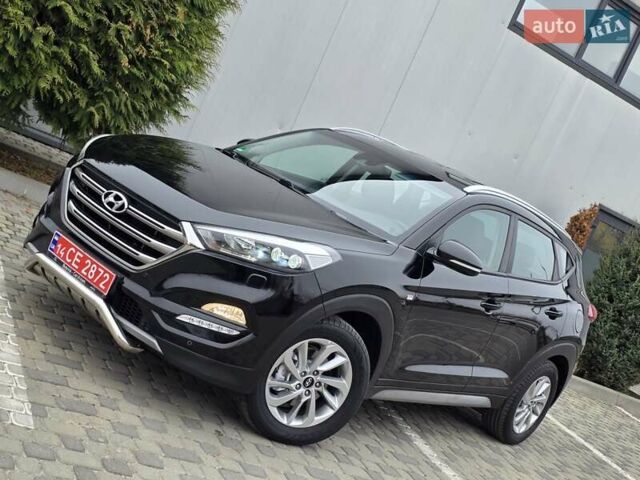 Черный Хендай Туксон, объемом двигателя 2 л и пробегом 151 тыс. км за 18950 $, фото 3 на Automoto.ua