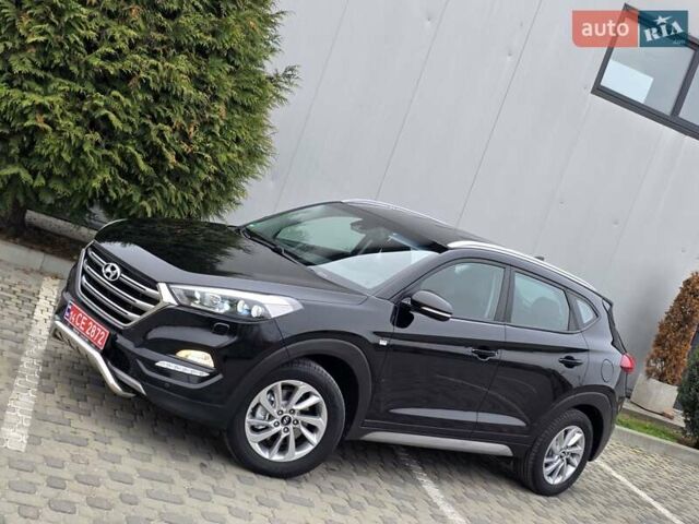 Черный Хендай Туксон, объемом двигателя 2 л и пробегом 151 тыс. км за 18950 $, фото 22 на Automoto.ua