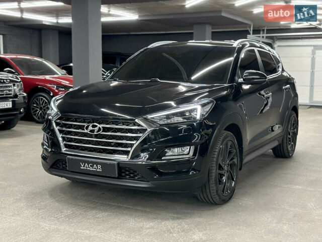 Черный Хендай Туксон, объемом двигателя 2 л и пробегом 153 тыс. км за 20500 $, фото 1 на Automoto.ua