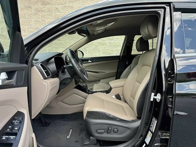 Черный Хендай Туксон, объемом двигателя 2.4 л и пробегом 42 тыс. км за 4100 $, фото 9 на Automoto.ua