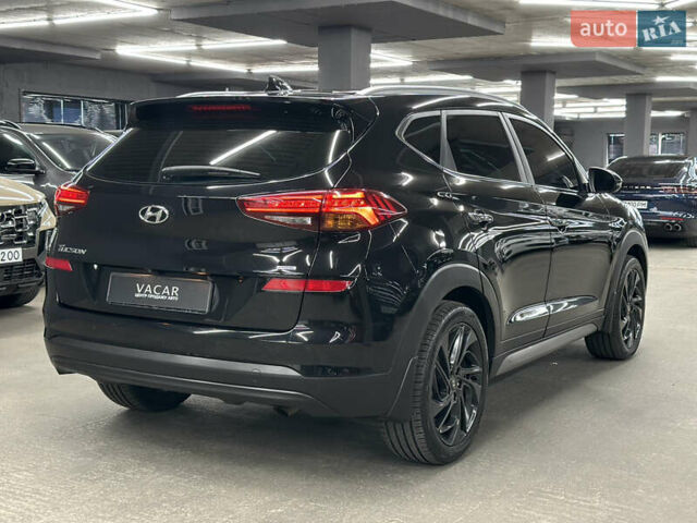 Черный Хендай Туксон, объемом двигателя 2 л и пробегом 153 тыс. км за 20500 $, фото 5 на Automoto.ua