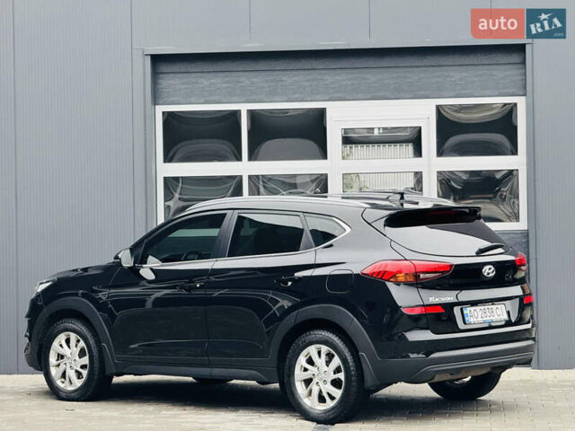 Чорний Хендай Туксон, об'ємом двигуна 2 л та пробігом 84 тис. км за 19000 $, фото 13 на Automoto.ua