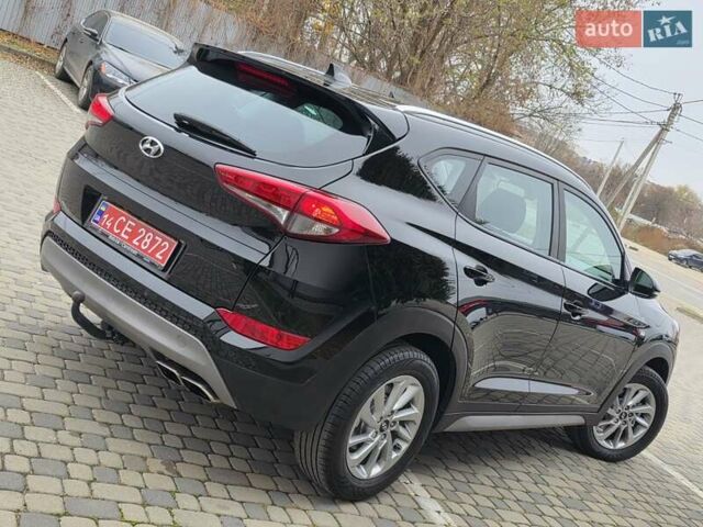 Черный Хендай Туксон, объемом двигателя 2 л и пробегом 151 тыс. км за 18950 $, фото 34 на Automoto.ua