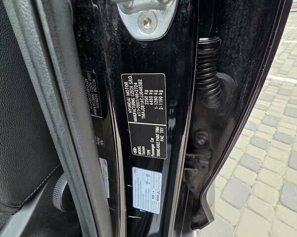 Черный Хендай Туксон, объемом двигателя 2 л и пробегом 151 тыс. км за 18950 $, фото 83 на Automoto.ua