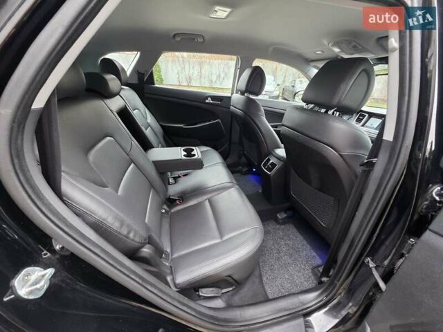 Черный Хендай Туксон, объемом двигателя 2 л и пробегом 151 тыс. км за 18950 $, фото 56 на Automoto.ua