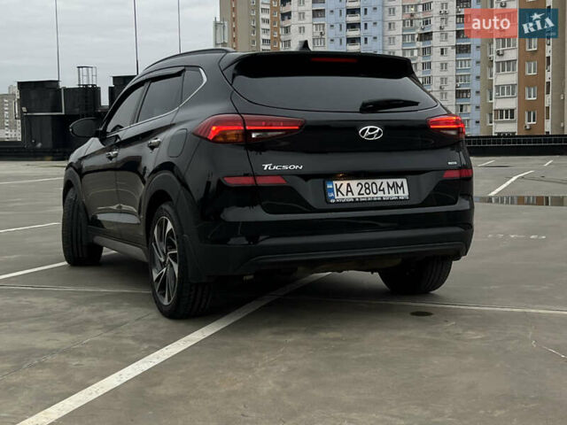 Чорний Хендай Туксон, об'ємом двигуна 2 л та пробігом 145 тис. км за 23900 $, фото 6 на Automoto.ua