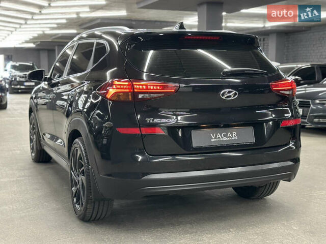 Черный Хендай Туксон, объемом двигателя 2 л и пробегом 153 тыс. км за 20500 $, фото 4 на Automoto.ua