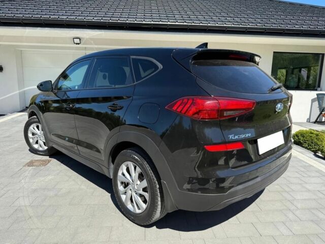 Черный Хендай Туксон, объемом двигателя 2 л и пробегом 80 тыс. км за 9500 $, фото 3 на Automoto.ua