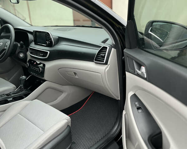 Черный Хендай Туксон, объемом двигателя 2 л и пробегом 192 тыс. км за 15200 $, фото 22 на Automoto.ua