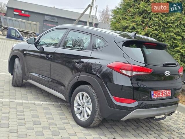 Черный Хендай Туксон, объемом двигателя 2 л и пробегом 151 тыс. км за 18950 $, фото 31 на Automoto.ua