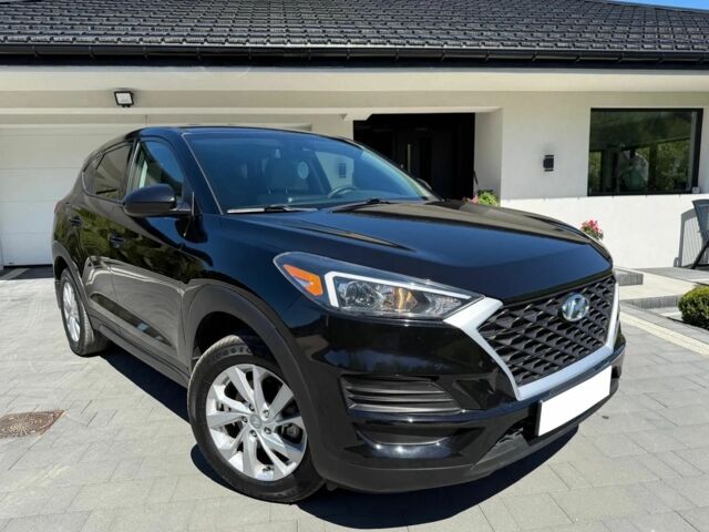 Черный Хендай Туксон, объемом двигателя 2 л и пробегом 80 тыс. км за 9500 $, фото 8 на Automoto.ua