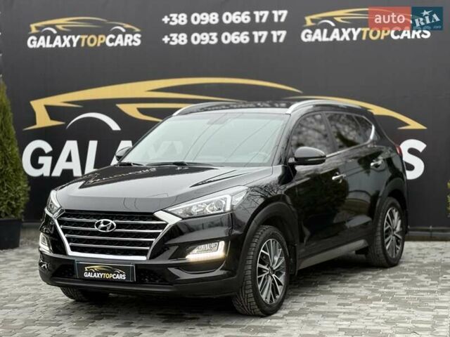 Черный Хендай Туксон, объемом двигателя 2 л и пробегом 55 тыс. км за 22300 $, фото 2 на Automoto.ua