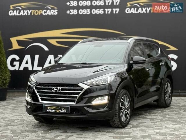 Черный Хендай Туксон, объемом двигателя 2 л и пробегом 55 тыс. км за 22300 $, фото 10 на Automoto.ua