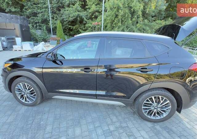 Черный Хендай Туксон, объемом двигателя 2.4 л и пробегом 69 тыс. км за 22000 $, фото 1 на Automoto.ua