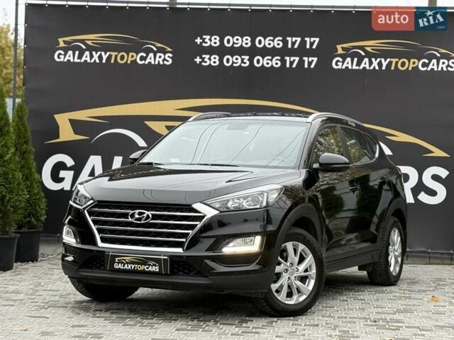 Черный Хендай Туксон, объемом двигателя 2 л и пробегом 77 тыс. км за 21500 $, фото 4 на Automoto.ua