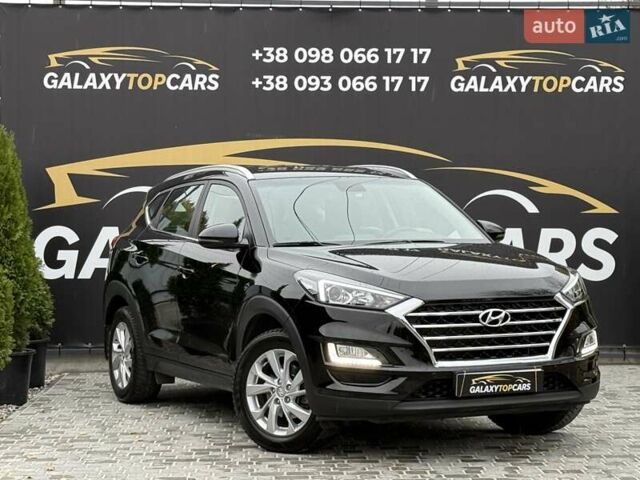 Черный Хендай Туксон, объемом двигателя 2 л и пробегом 77 тыс. км за 21500 $, фото 13 на Automoto.ua