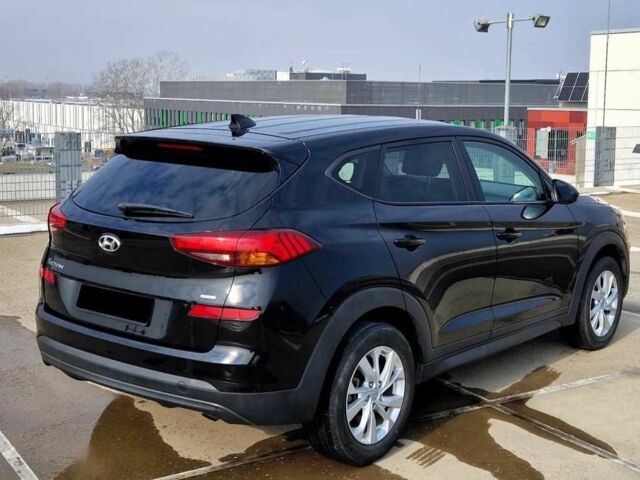 Черный Хендай Туксон, объемом двигателя 2 л и пробегом 76 тыс. км за 11200 $, фото 3 на Automoto.ua