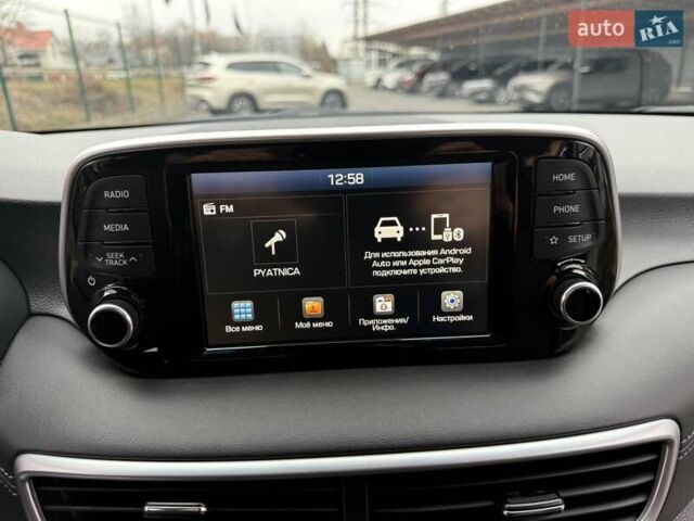 Черный Хендай Туксон, объемом двигателя 2 л и пробегом 55 тыс. км за 22300 $, фото 40 на Automoto.ua