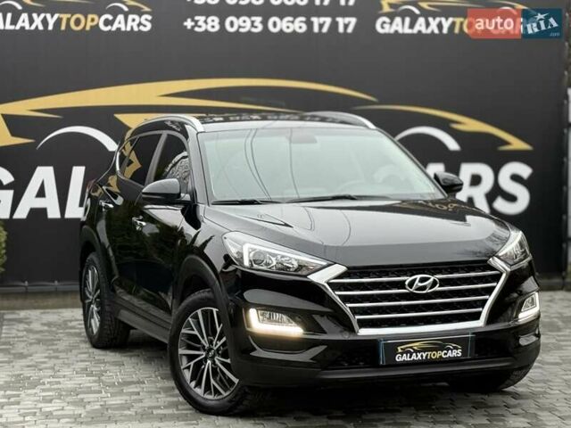 Черный Хендай Туксон, объемом двигателя 2 л и пробегом 55 тыс. км за 22300 $, фото 5 на Automoto.ua