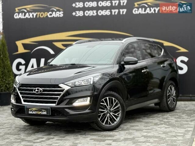 Черный Хендай Туксон, объемом двигателя 2 л и пробегом 55 тыс. км за 22300 $, фото 11 на Automoto.ua