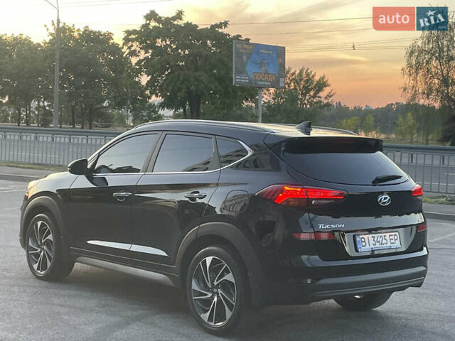 Черный Хендай Туксон, объемом двигателя 2 л и пробегом 67 тыс. км за 23700 $, фото 4 на Automoto.ua