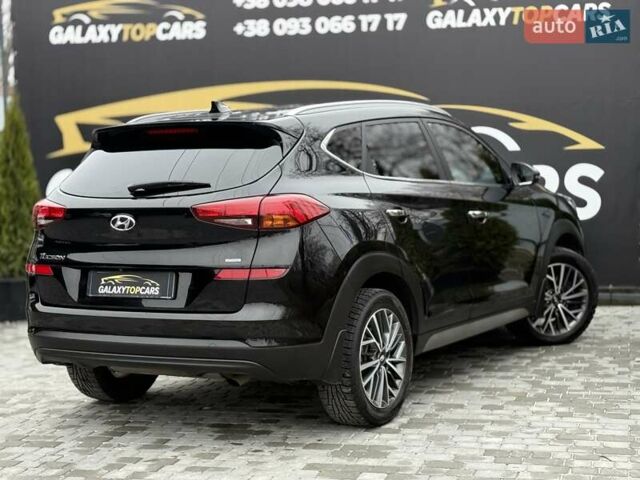 Черный Хендай Туксон, объемом двигателя 2 л и пробегом 55 тыс. км за 22300 $, фото 22 на Automoto.ua