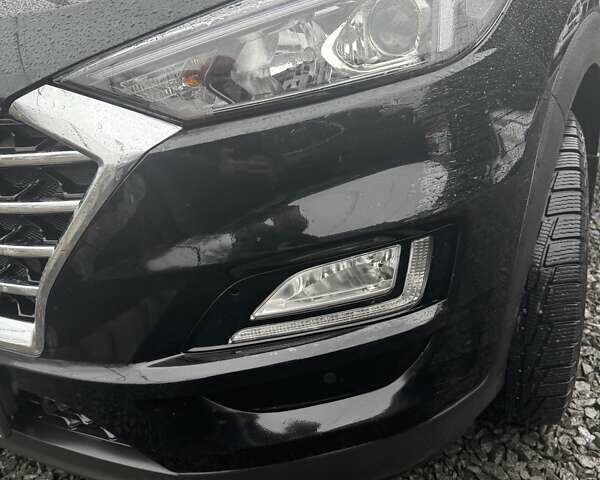 Черный Хендай Туксон, объемом двигателя 2 л и пробегом 55 тыс. км за 25000 $, фото 5 на Automoto.ua