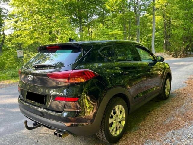 Черный Хендай Туксон, объемом двигателя 2 л и пробегом 89 тыс. км за 12400 $, фото 1 на Automoto.ua