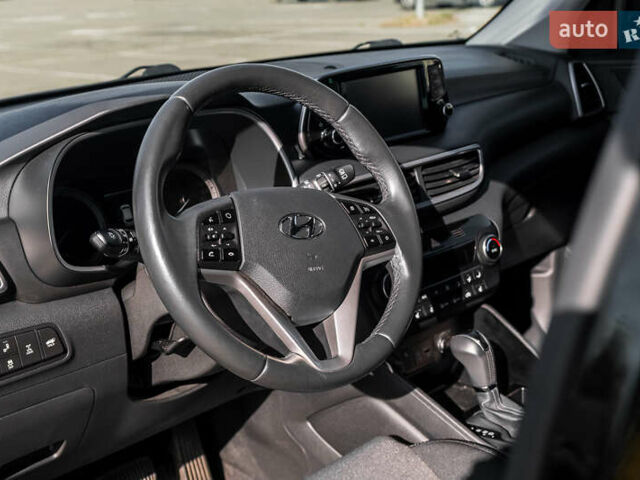 Черный Хендай Туксон, объемом двигателя 2 л и пробегом 88 тыс. км за 23000 $, фото 13 на Automoto.ua