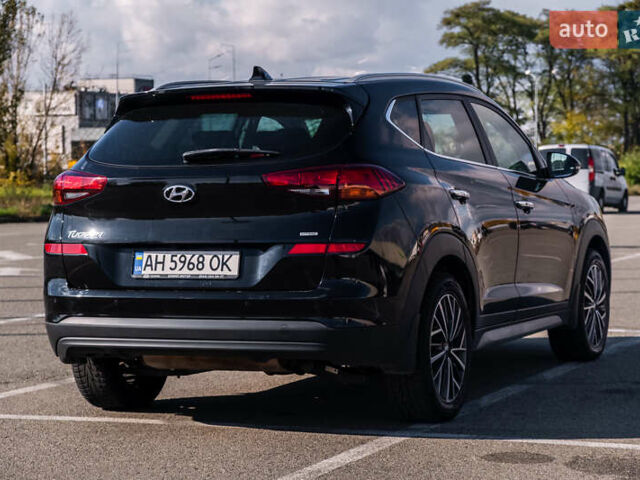 Черный Хендай Туксон, объемом двигателя 2 л и пробегом 88 тыс. км за 23000 $, фото 7 на Automoto.ua