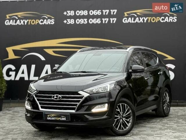 Черный Хендай Туксон, объемом двигателя 2 л и пробегом 55 тыс. км за 22300 $, фото 3 на Automoto.ua