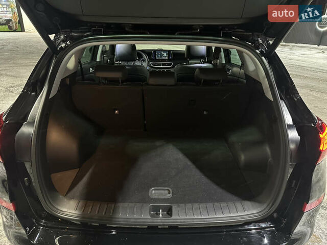 Черный Хендай Туксон, объемом двигателя 2 л и пробегом 86 тыс. км за 31000 $, фото 18 на Automoto.ua