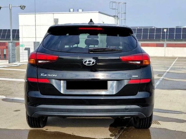 Черный Хендай Туксон, объемом двигателя 2 л и пробегом 76 тыс. км за 11200 $, фото 2 на Automoto.ua