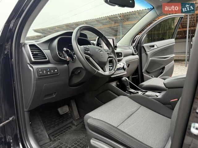 Черный Хендай Туксон, объемом двигателя 2 л и пробегом 55 тыс. км за 22300 $, фото 41 на Automoto.ua