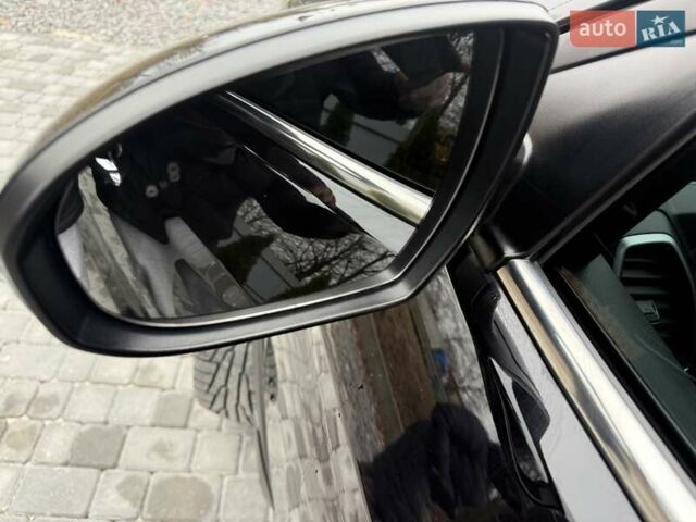 Черный Хендай Туксон, объемом двигателя 2 л и пробегом 55 тыс. км за 22300 $, фото 16 на Automoto.ua