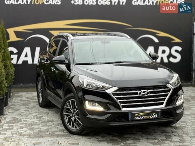 Черный Хендай Туксон, объемом двигателя 2 л и пробегом 55 тыс. км за 22300 $, фото 7 на Automoto.ua