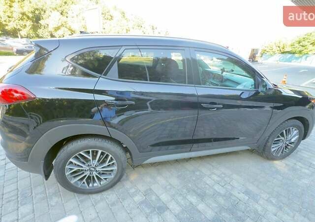 Черный Хендай Туксон, объемом двигателя 2.4 л и пробегом 69 тыс. км за 22000 $, фото 2 на Automoto.ua