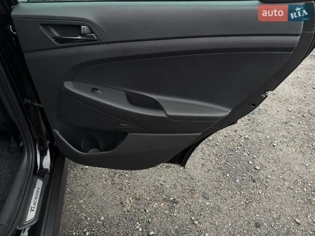 Черный Хендай Туксон, объемом двигателя 2 л и пробегом 98 тыс. км за 25900 $, фото 40 на Automoto.ua