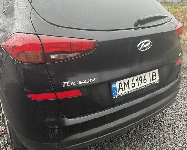 Черный Хендай Туксон, объемом двигателя 2 л и пробегом 55 тыс. км за 25000 $, фото 7 на Automoto.ua