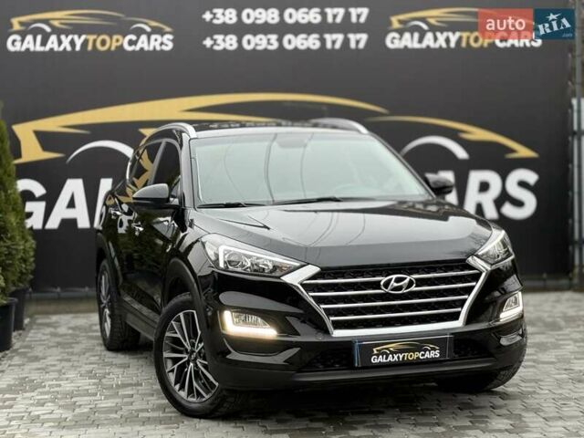 Черный Хендай Туксон, объемом двигателя 2 л и пробегом 55 тыс. км за 22300 $, фото 6 на Automoto.ua
