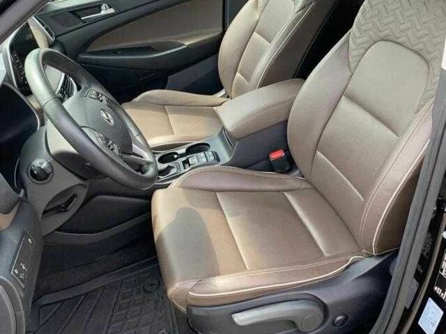 Черный Хендай Туксон, объемом двигателя 2 л и пробегом 129 тыс. км за 16500 $, фото 6 на Automoto.ua